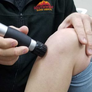 Radial pressure wave therapy on knee